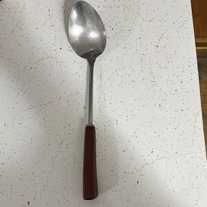 Vintage stainless steel serving spoon